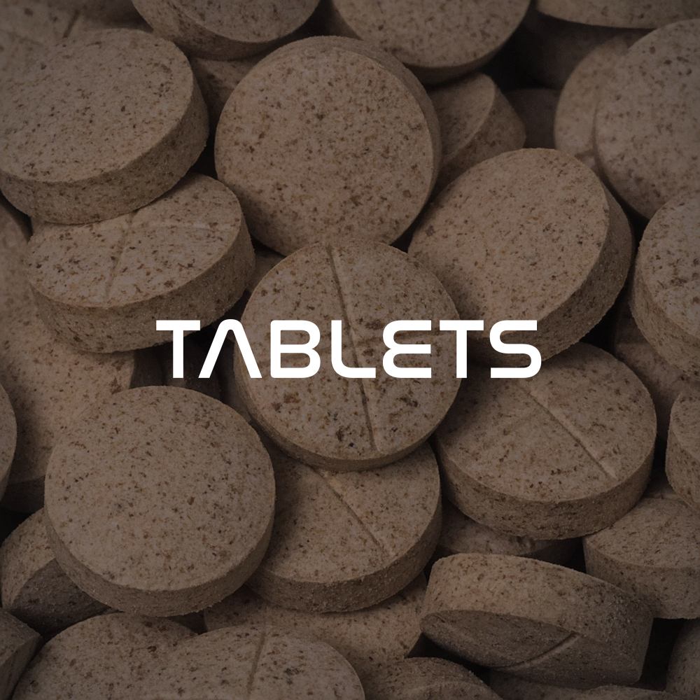 Close-up of brown 7-oh tablets with 'TABLETS' text overlay