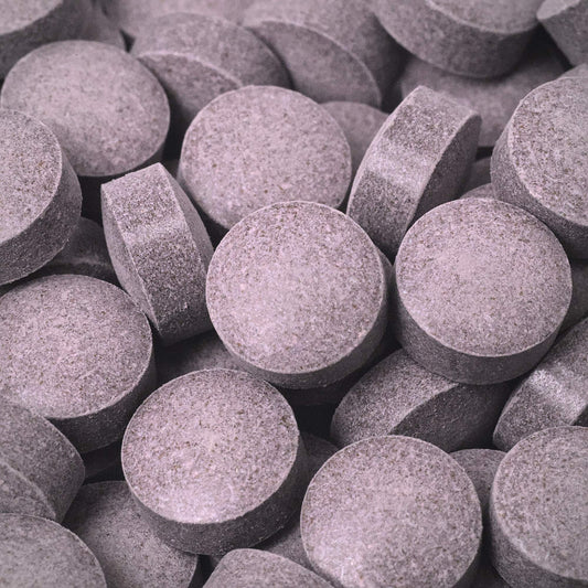 Close-up of gray 7ohBLACK 7-oh tablets